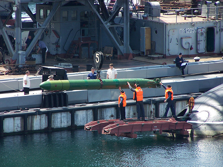 Loading a torpedo on a Russian Black Sea Fleet Kilo-class attack submarine B-871 Alrosa